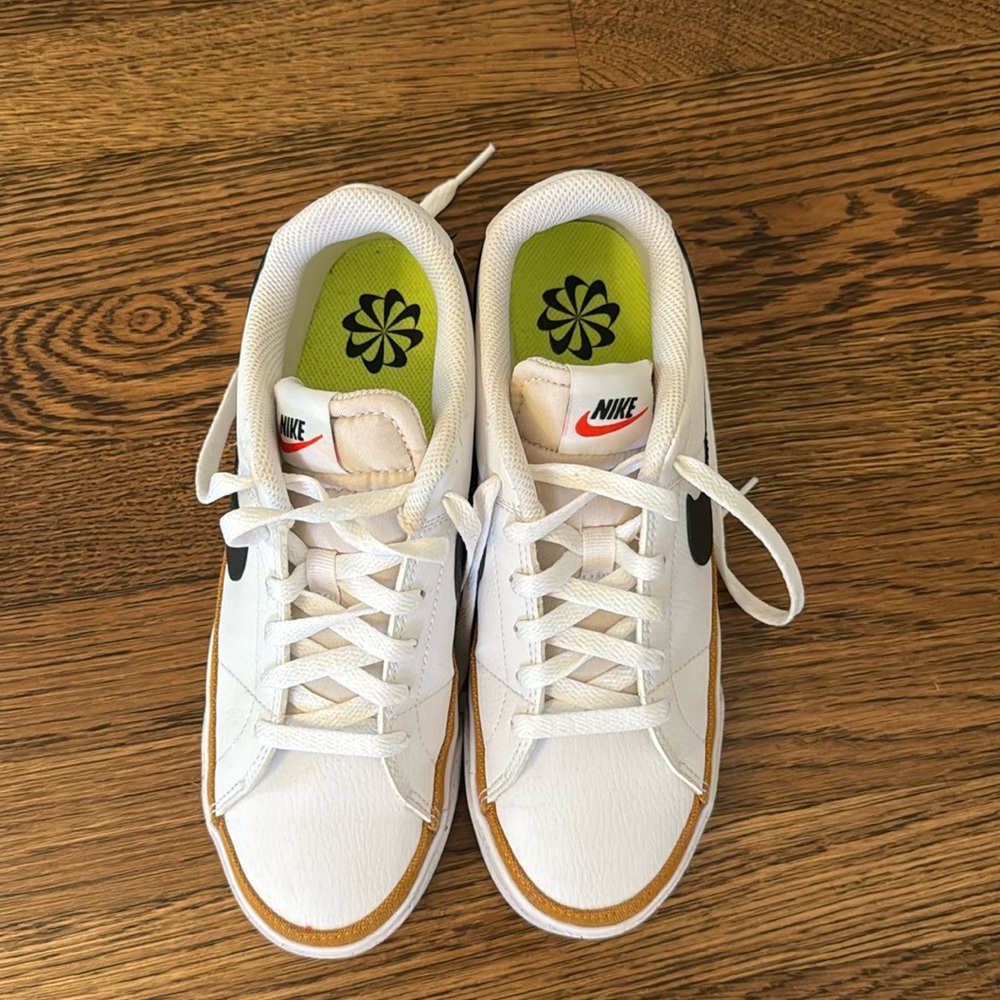 Nike shoes -adorable with dresses. Worn once-leather with canvas piping